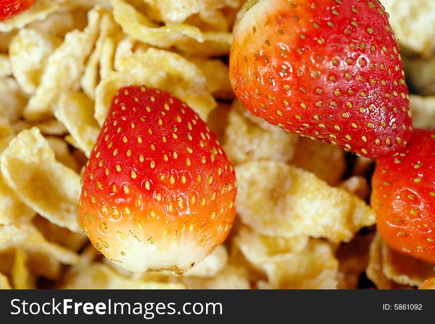 Macro shot of a cereal bowl with strawberries. Macro shot of a cereal bowl with strawberries