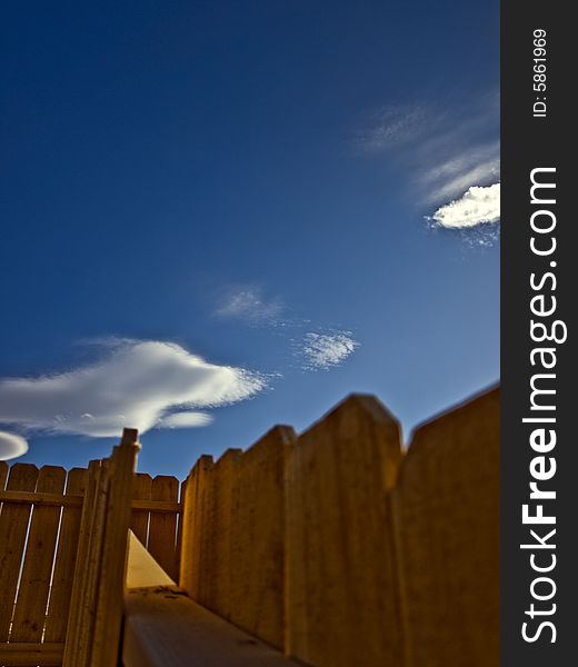 Fence Leading To The Sky