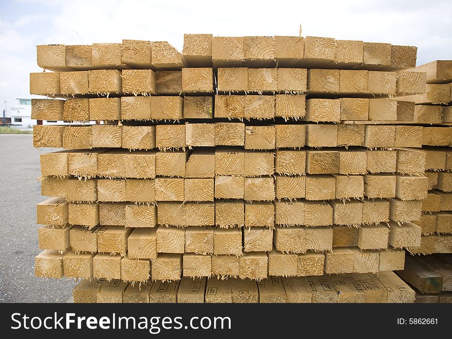 A pile of wood, beam, stapled ready for transport. Picture was taken at the harbour of Antwerp, Belgium.
Nikon D-80, tripod, cloudy light