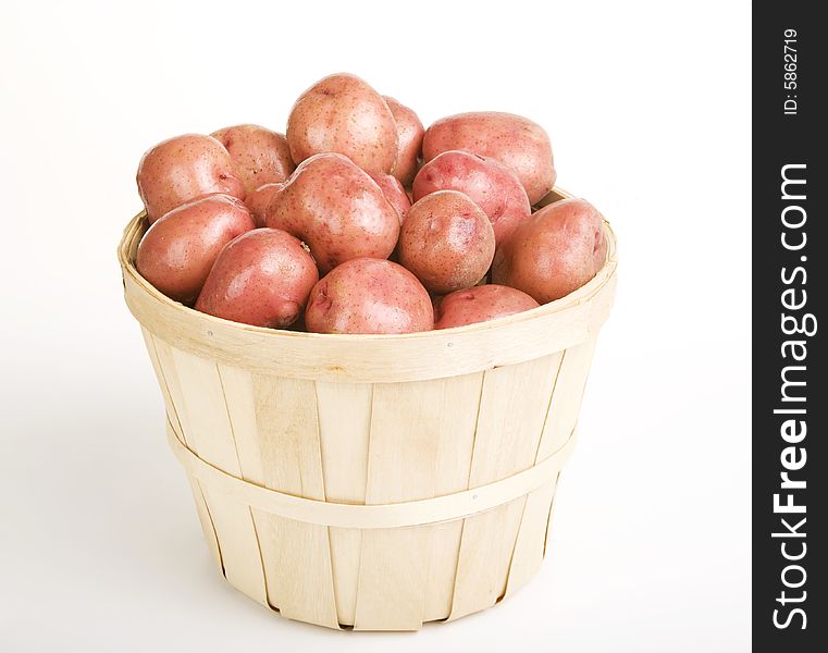 Red Potatoes gathered in a Woven Basket