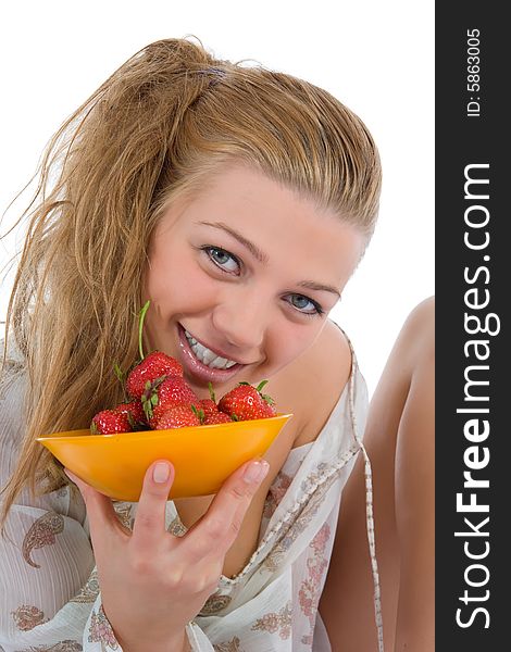 Beautiful girl with strawberry over white