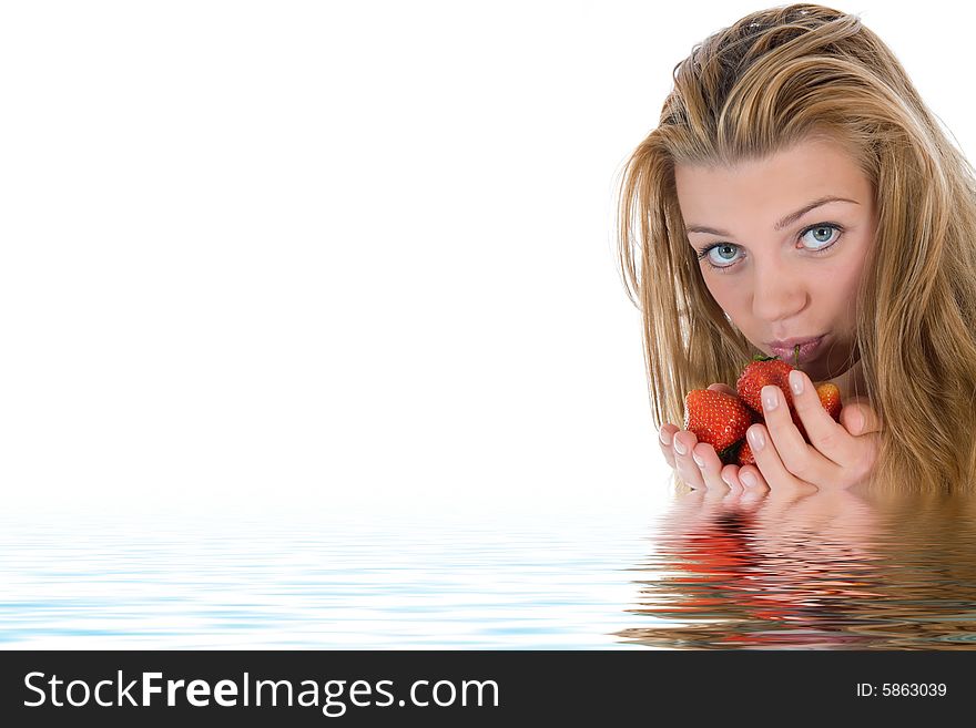 Beautiful girl with strawberry over white