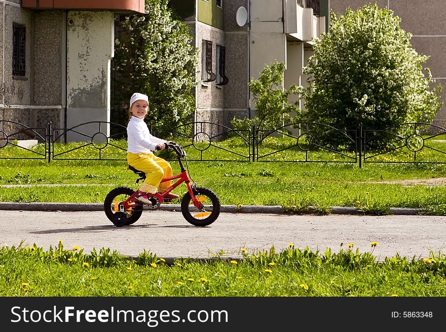 Picture of my daughter going for a drive a bicycle. Picture of my daughter going for a drive a bicycle