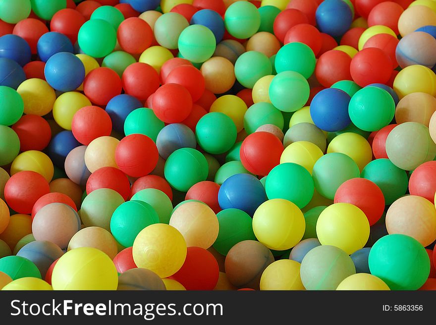 Many colorful plastic small balls.