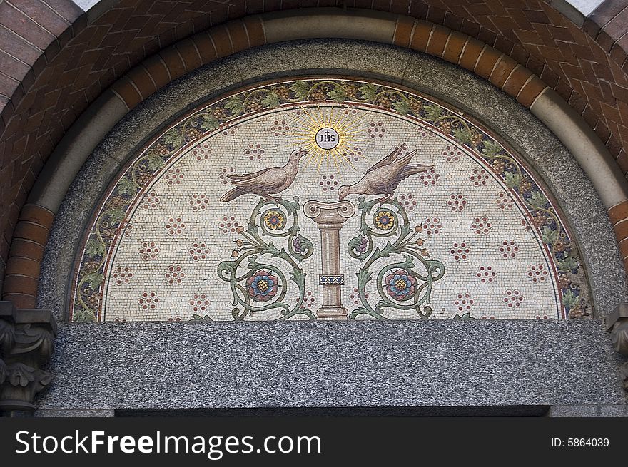 A mosaic in a arch of an old church. A mosaic in a arch of an old church