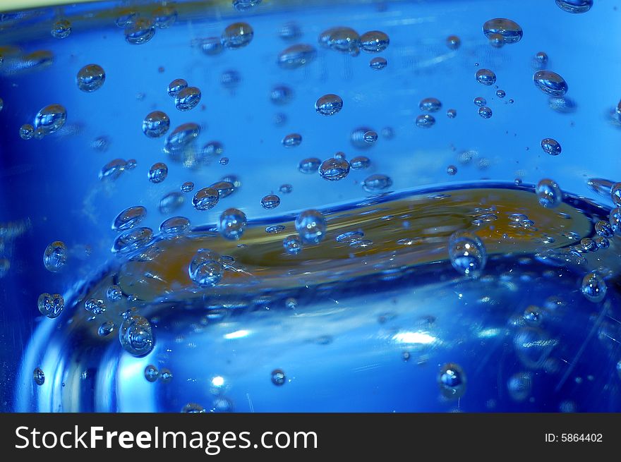 Blue water with bubbles high resolution image