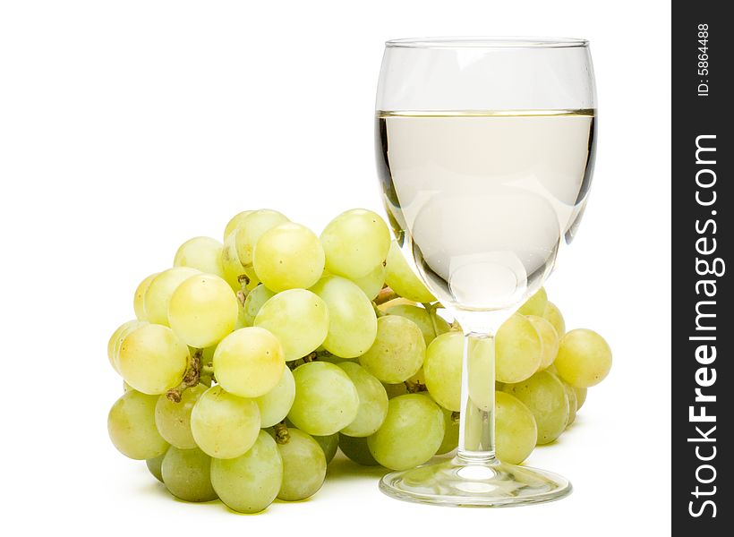 Wine in a glass and grapes