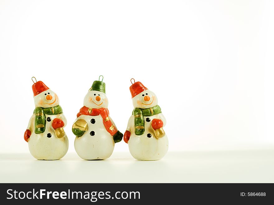 Three Snowmens on white background - Christmas decoration