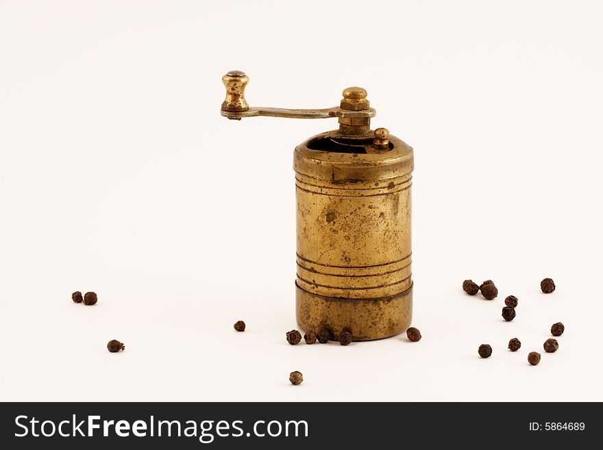 Old bronze pepper-mill with rust. Old bronze pepper-mill with rust