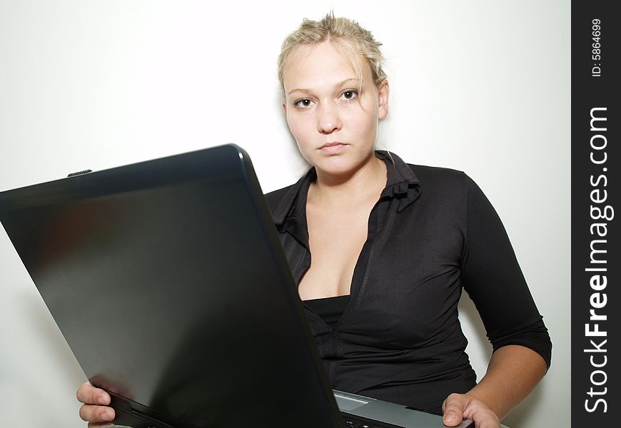 Beautiful girl with black laptop. Beautiful girl with black laptop