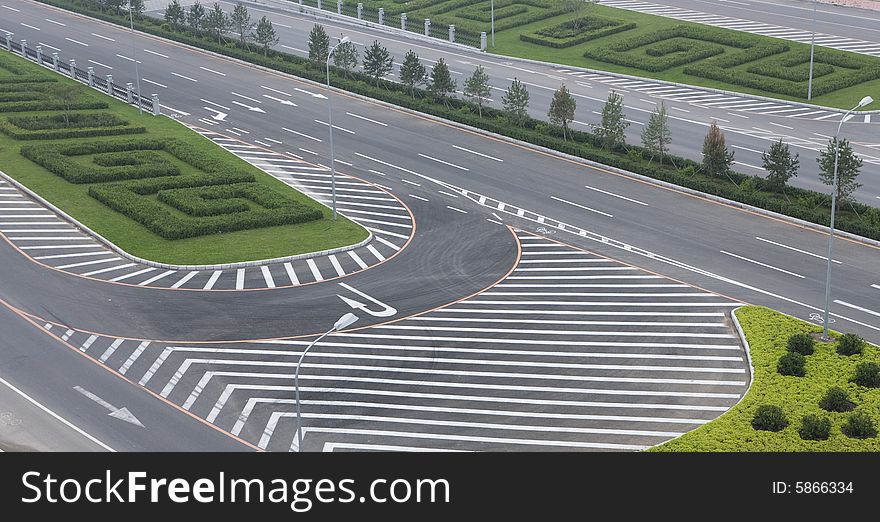 Square-built road with virescence photographed from above. Square-built road with virescence photographed from above.