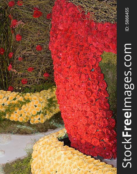 Stack of beautiful yellow and red roses as a background of wedding ceremony. Stack of beautiful yellow and red roses as a background of wedding ceremony