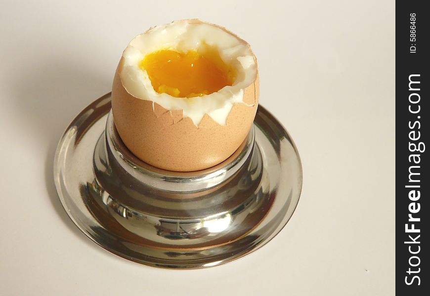 A close up of a Breakfast-egg over white