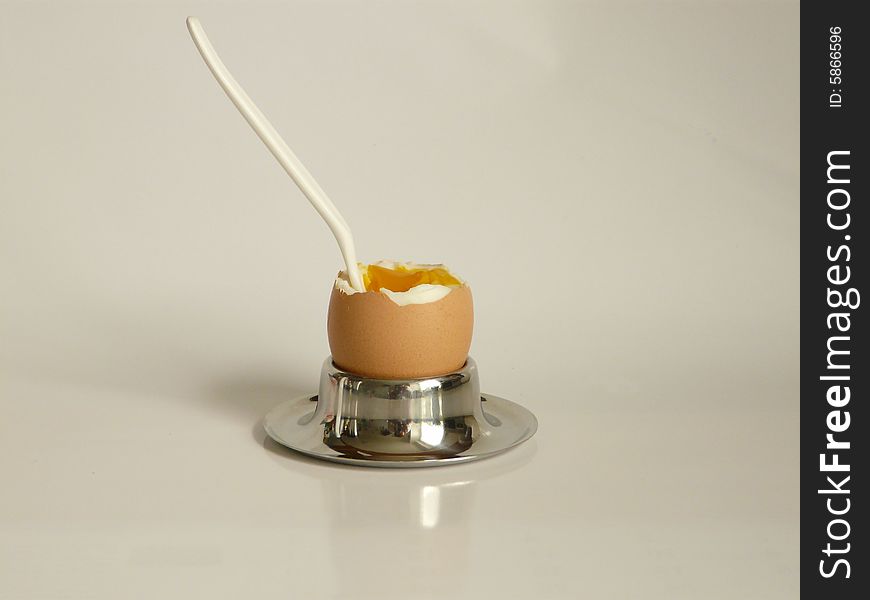 A close up of a Breakfast-egg over white