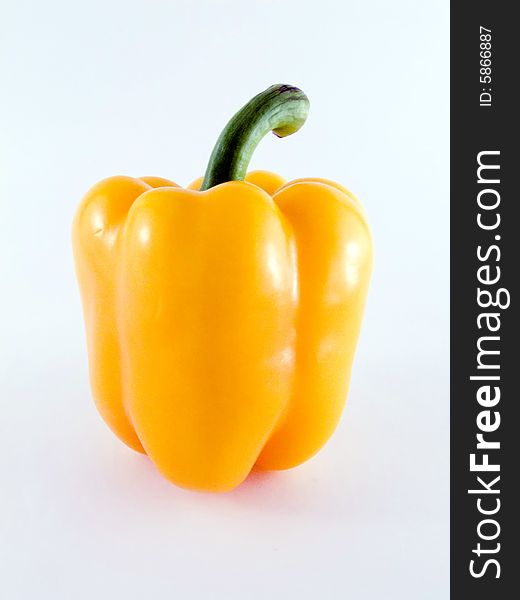 Yellow pepper on the background