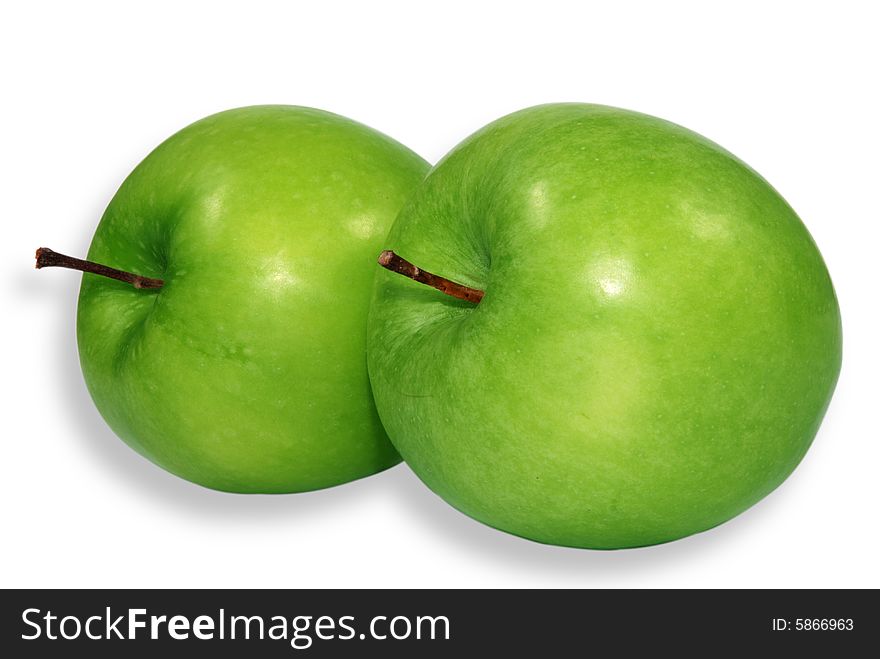 Two green apples isolated on a  white background . Two green apples isolated on a  white background .