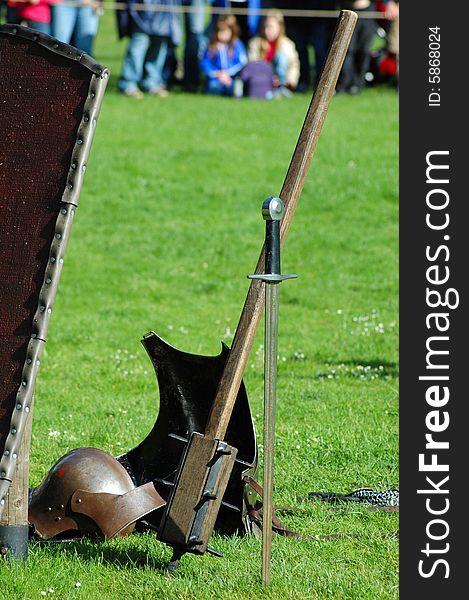 Different weapons lying on a grass. Different weapons lying on a grass