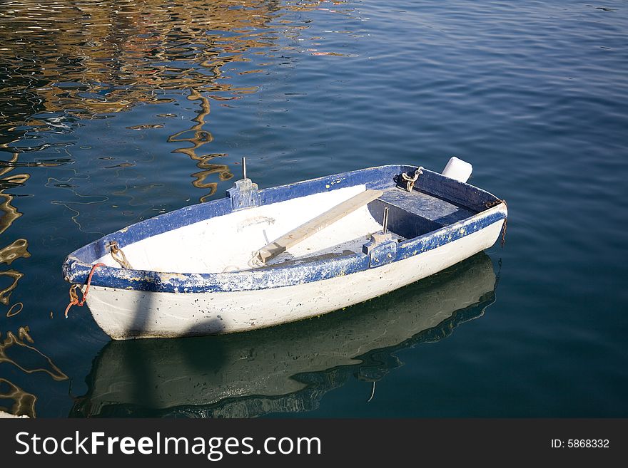 Little boat in a bay