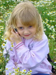 Little Girl With Mobile Telephone. Royalty Free Stock Photo Little Girl With Mobile Telephone. Royalty Free Stock Photo