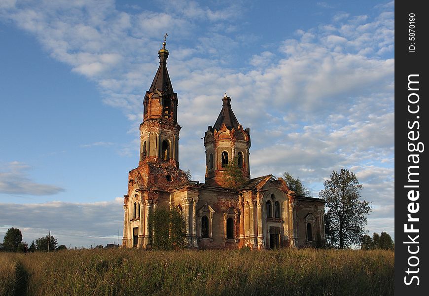 Abandoned church on background cloud