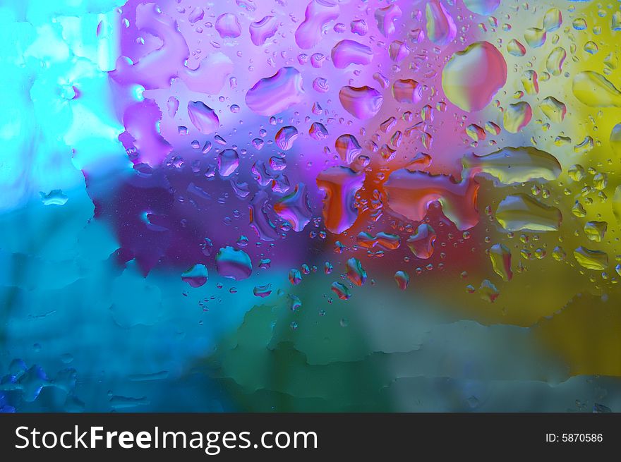 Abstract figure with water drops on glass