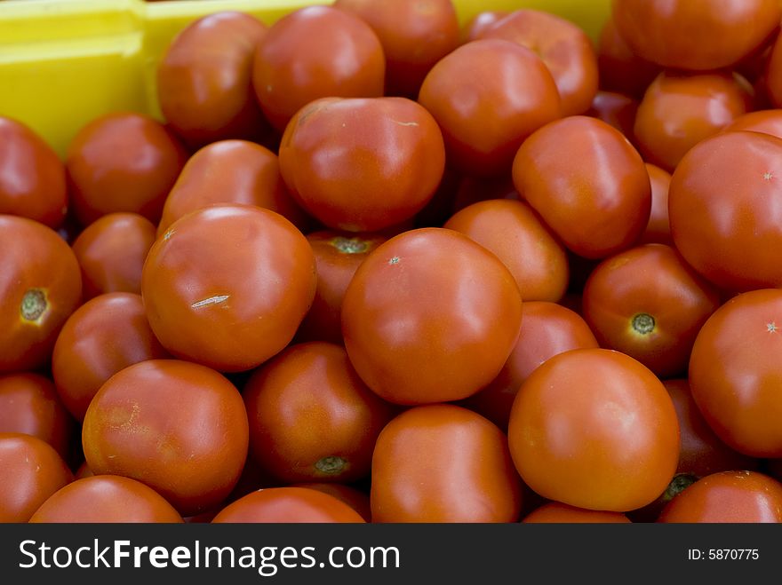 Beautiful red tomatoes at a local market.