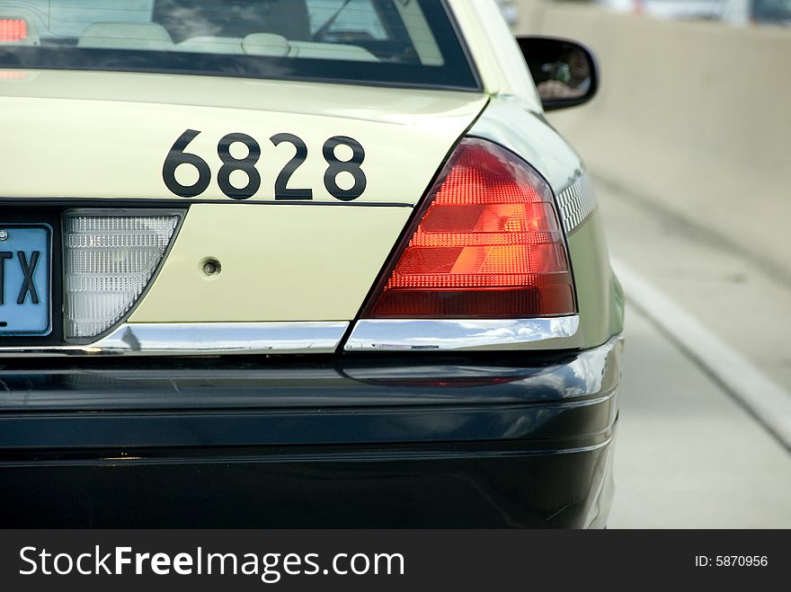 A taxi stuck in traffic. A taxi stuck in traffic.