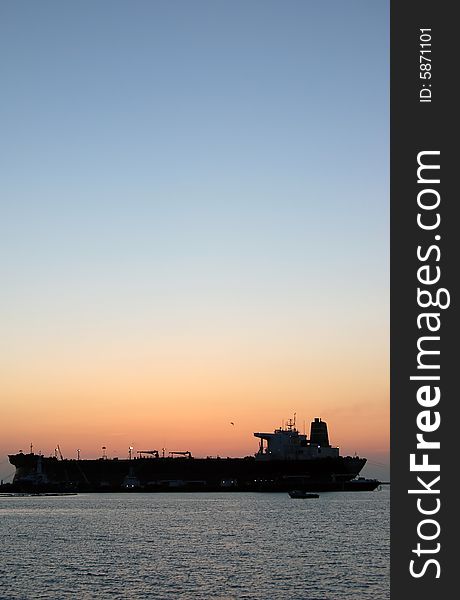 A silhouette of a ferry boat. A silhouette of a ferry boat.