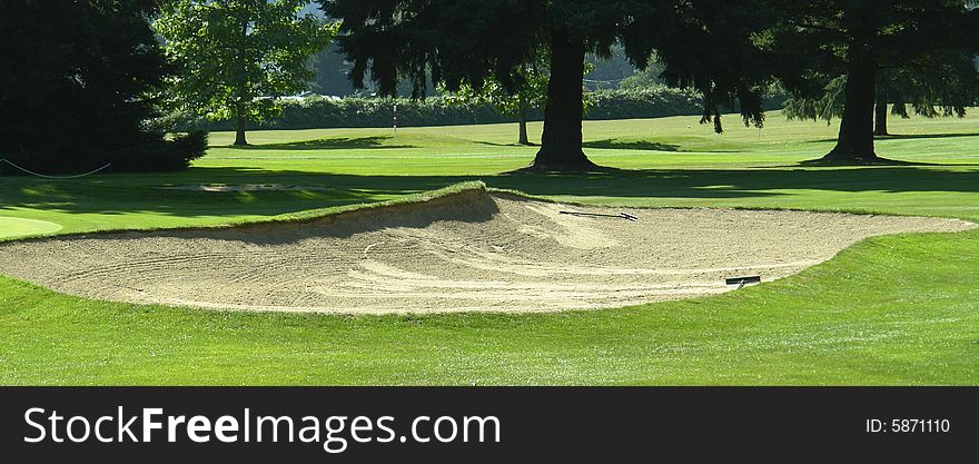 Sand trap near the green onan executive golf course. Sand trap near the green onan executive golf course