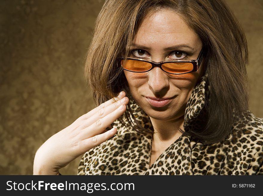 Portrait of a Hispanic woman wearing sunglasses with a confident attitude. Portrait of a Hispanic woman wearing sunglasses with a confident attitude