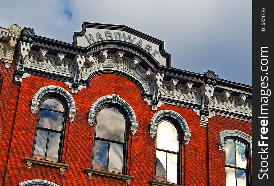 View of historic old hardware building with ornate detail.