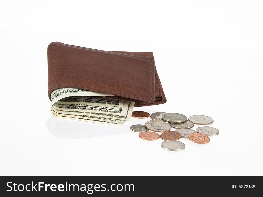 A Wallet whit dollars and coins. A Wallet whit dollars and coins