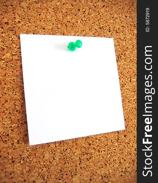White blank note pind to cork board. White blank note pind to cork board