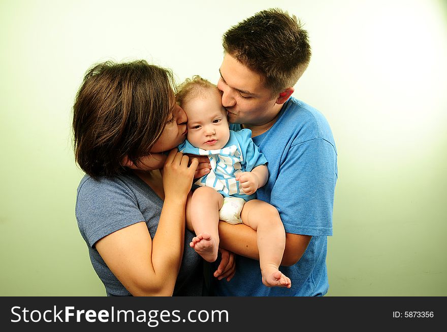 Happy family mother, dad and baby