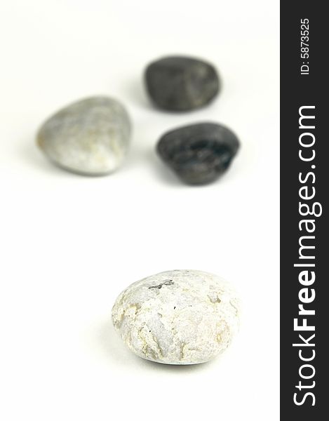 River rocks isolated against a white background