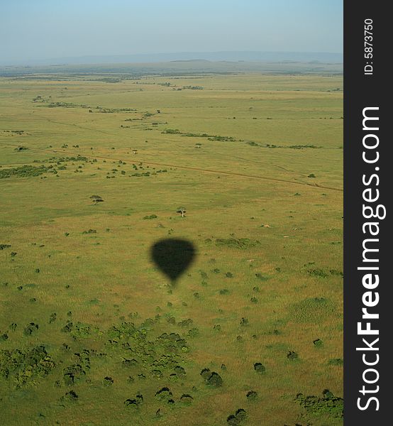 Balloon shadow over the Masai Mara Kenya Africa