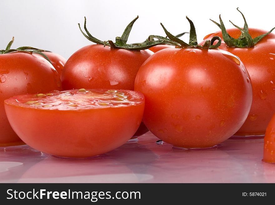 Fresh and nice tomatoes with water droplets.