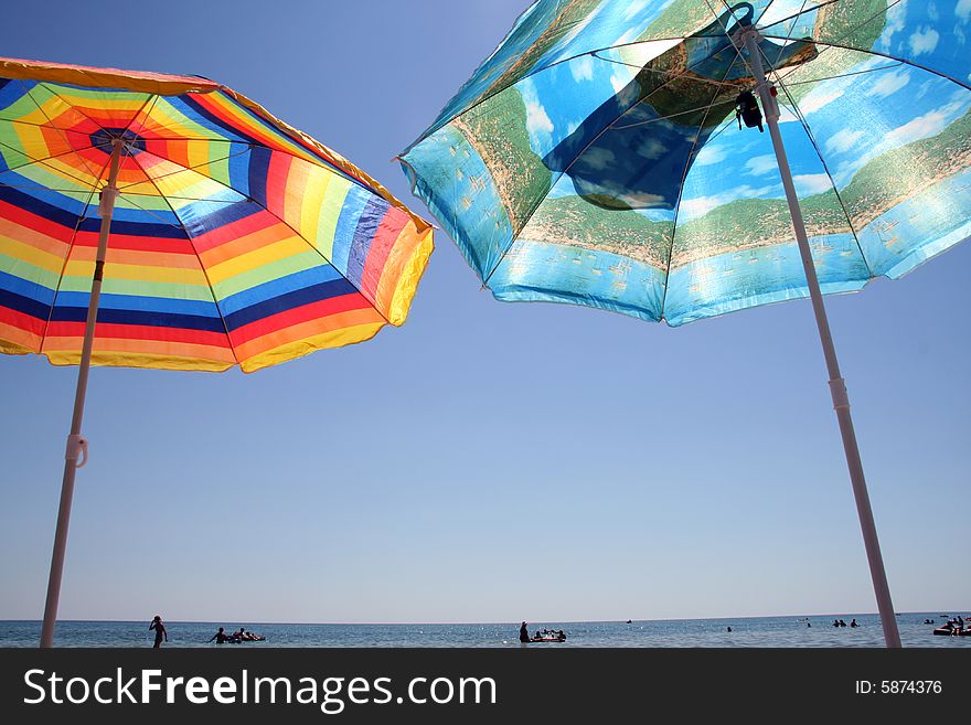 Umbrellas on sunny beach