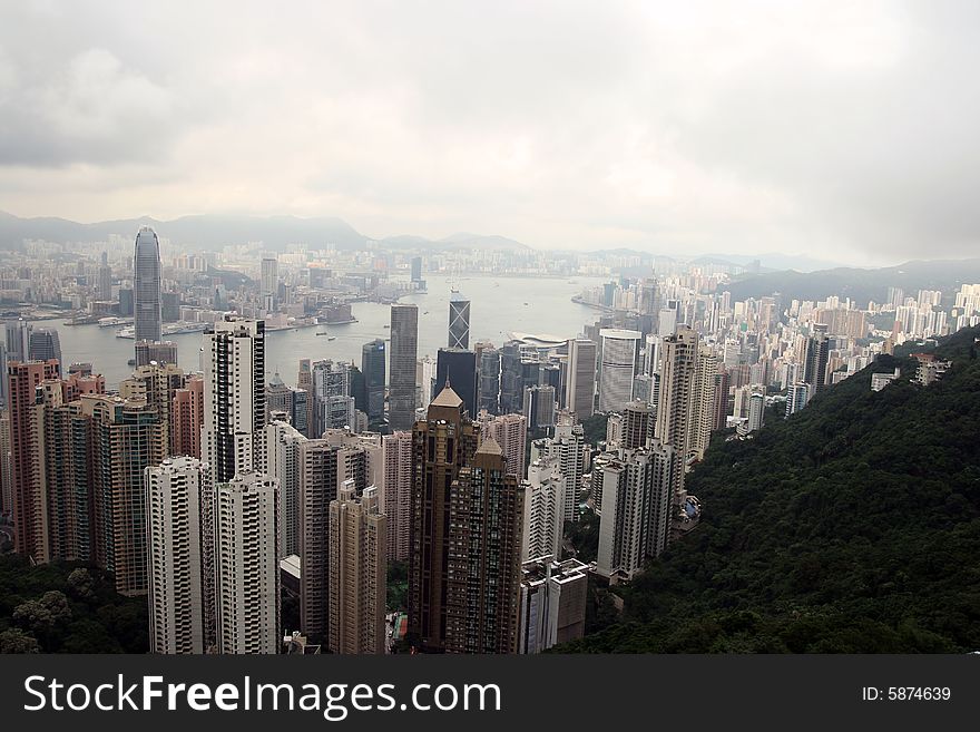 Hong Kong skyline from Victoria peak on a cloudy day.