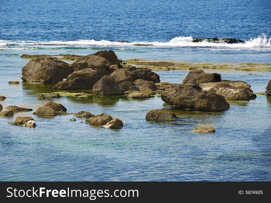 Rocks in the mediterrean sea near Livorno in Italy