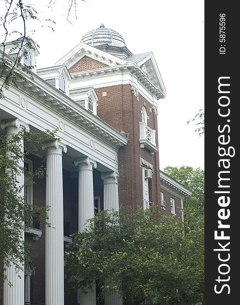 Large brick Colonial edifice could be on campus, in an office park, or housing government operations. Large brick Colonial edifice could be on campus, in an office park, or housing government operations.