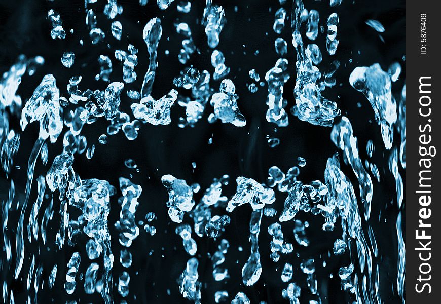 Blue water droplets against a black background