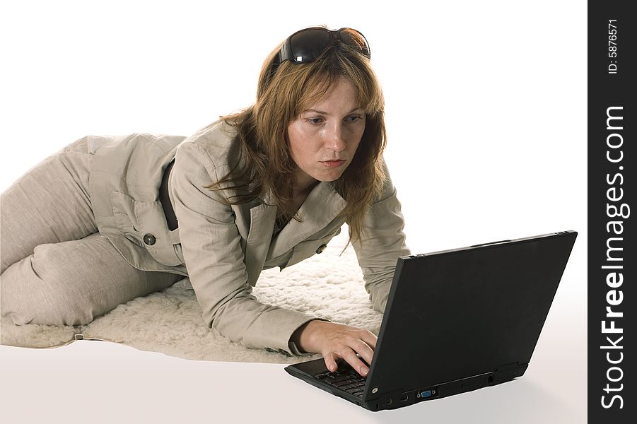 Young women with laptop on white. Young women with laptop on white