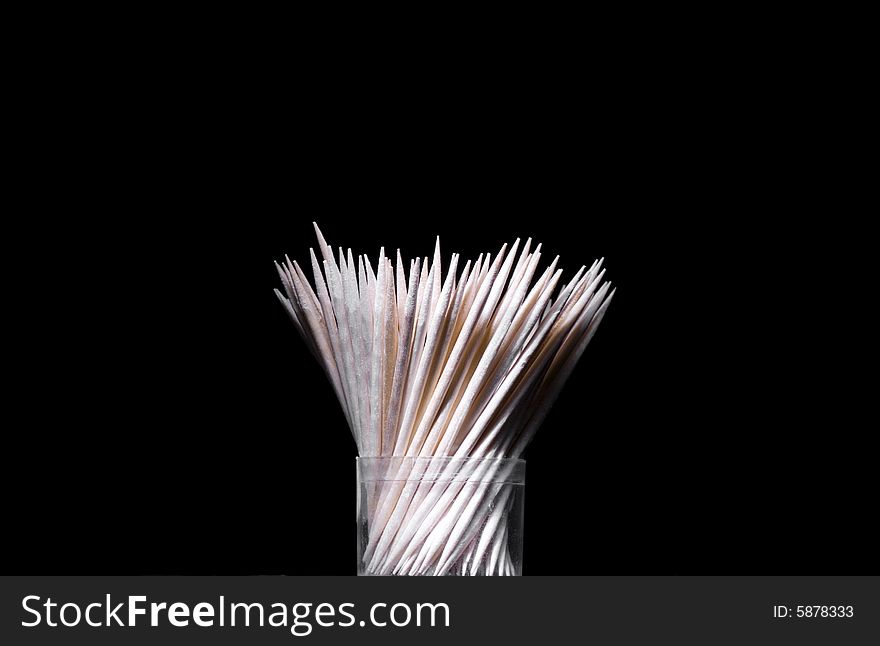 Toothpick isolated on black background