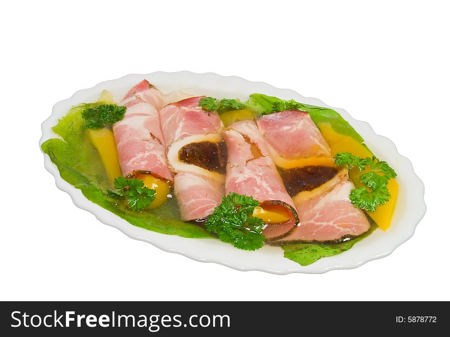 Ham in jelly with smoked plum and pineapple. Isolated on white background. Working path included.