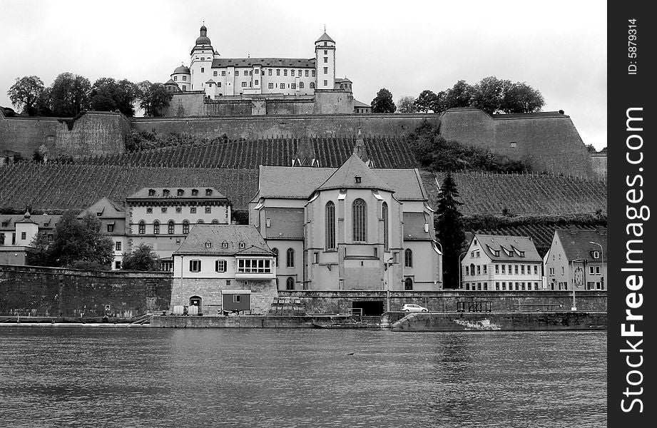 Wonderful view of homes and church across the river, in Wurzburg, Germany. Wonderful view of homes and church across the river, in Wurzburg, Germany.