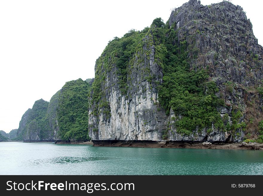 Traveling through scenic and tropical ha long bay in northern vietnam. Traveling through scenic and tropical ha long bay in northern vietnam