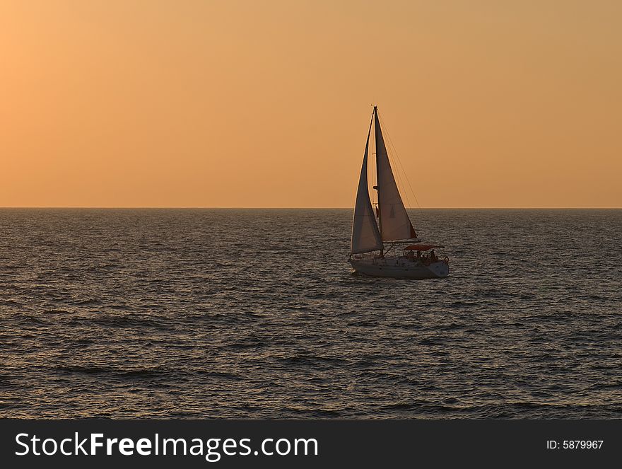 Yacht On Sunset