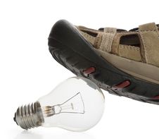 Man Shoe Steeping And Crushing The Bulb, Side View Stock Photos Man Shoe Steeping And Crushing The Bulb, Side View Stock Photos