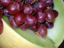 Red Grapes And Honeydew Melon Royalty Free Stock Photo